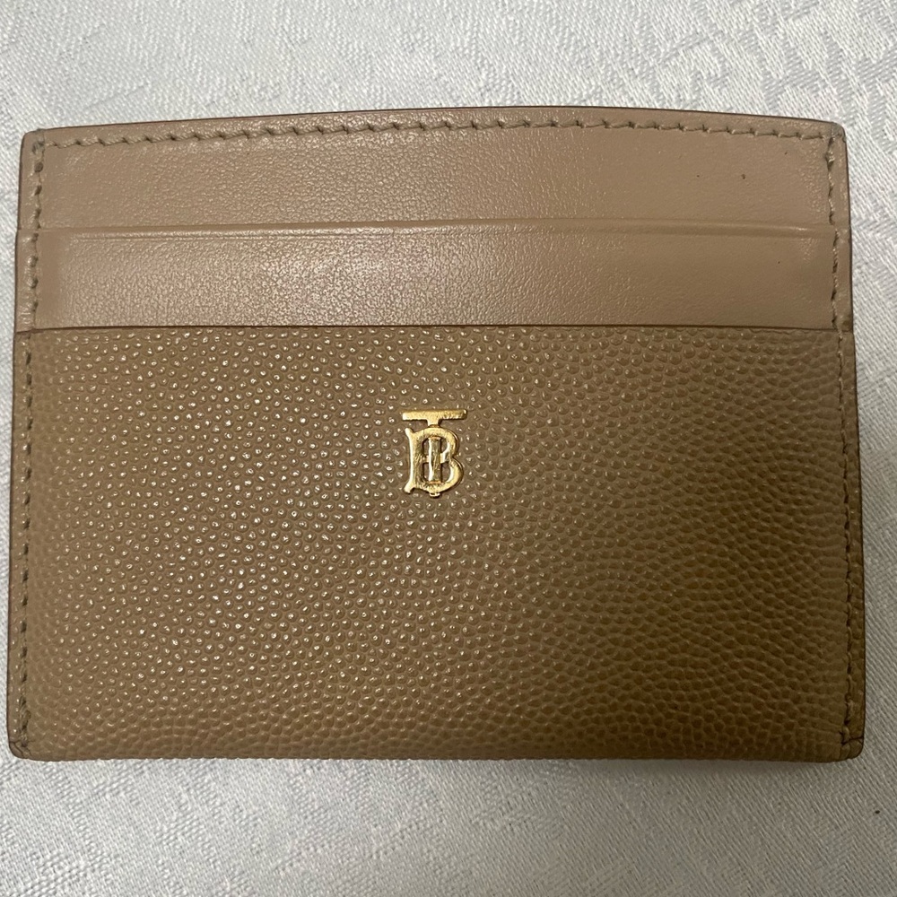 Authentic Burberry card holder in beige color.